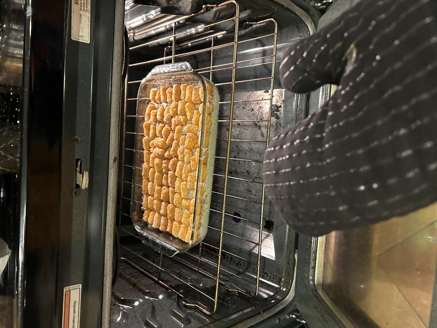 Placing casserole in oven
