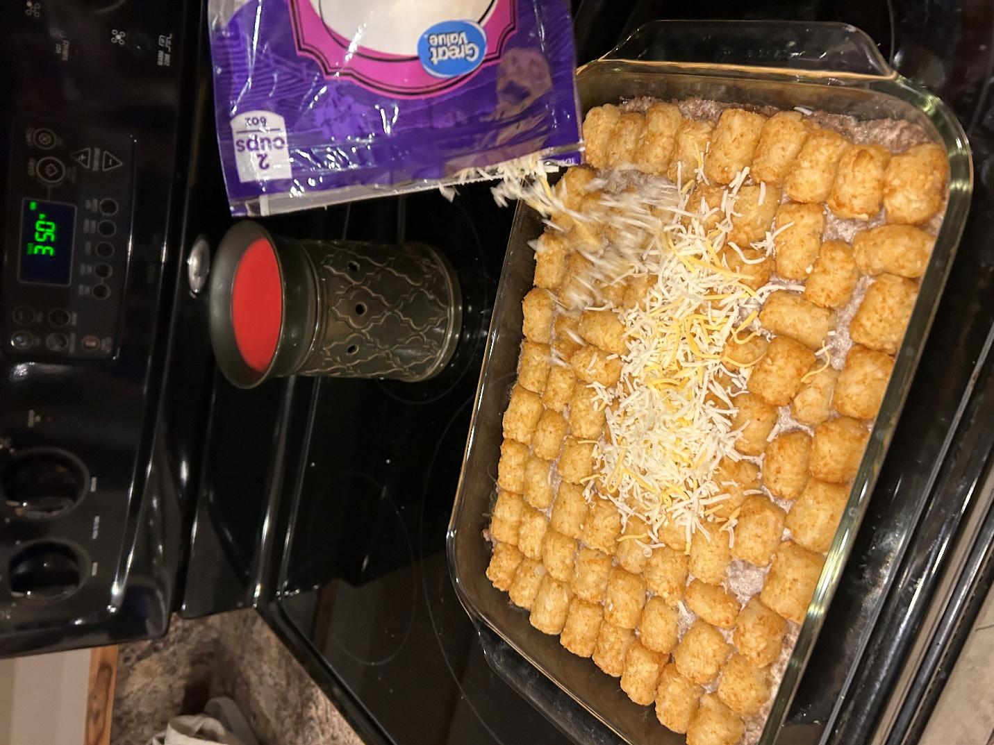 Spreading cheese on top