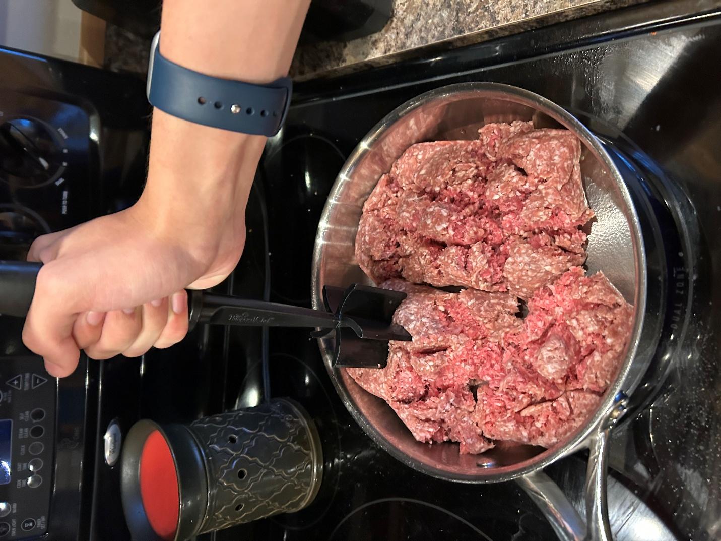 Chopping ground beef